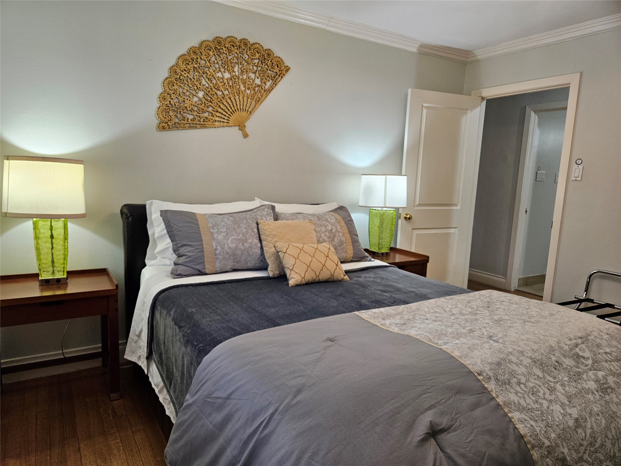 5203 Chesapeake Way Houston, TX 77056 - Photo 14 of 28 a bedroom with a bed and a night stand