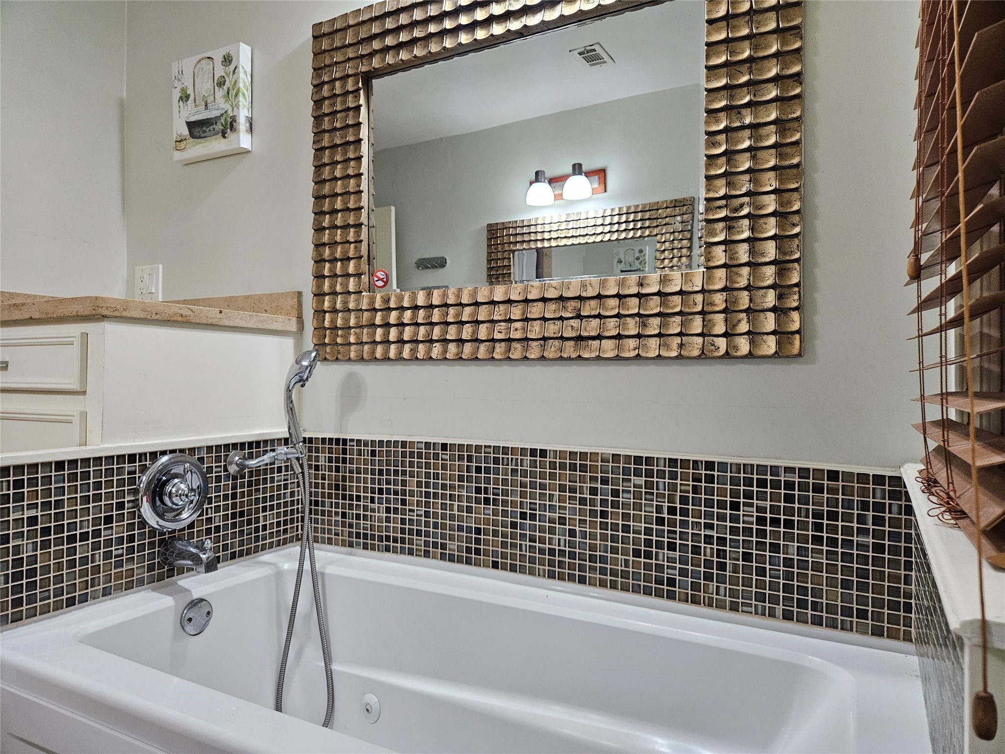 5203 Chesapeake Way Houston, TX 77056 - Photo 18 of 28 a bathroom with a bathtub and shower