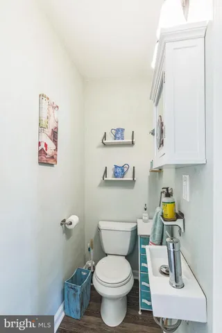 a bathroom with a toilet and a sink