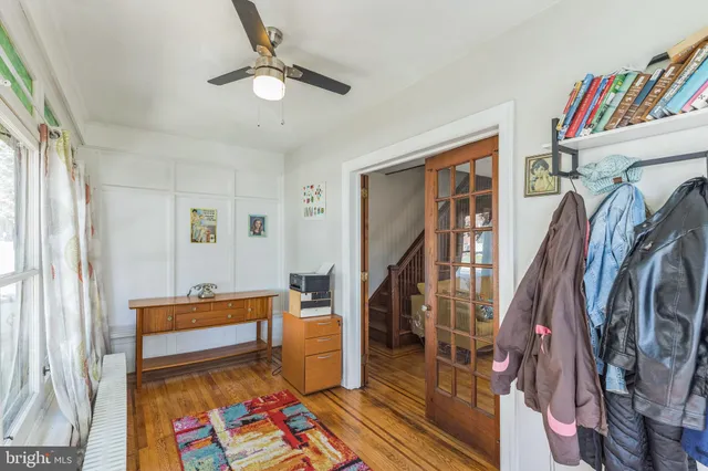 a living room with lots of furniture and a rug