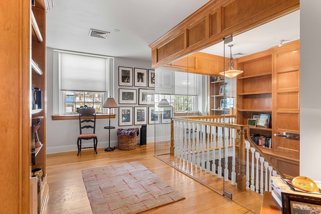 391 Walnut Street, Unit 4 Newton, MA 02460 - Photo 12 of 26 a view of a balcony with chairs