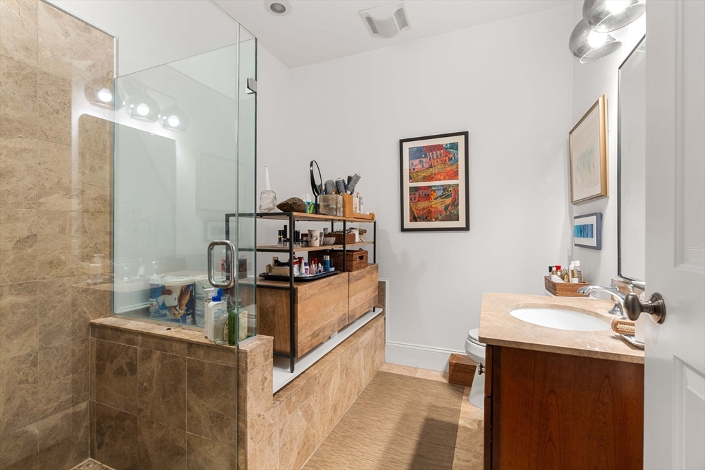 391 Walnut Street, Unit 4 Newton, MA 02460 - Photo 15 of 26 a view of living room with furniture and a mirror