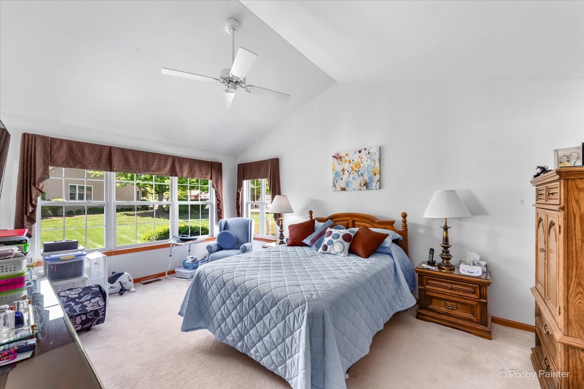 13412 Tall Pines Lane Plainfield, IL 60544 - Photo 11 of 19 a bed room with a bed and a large window