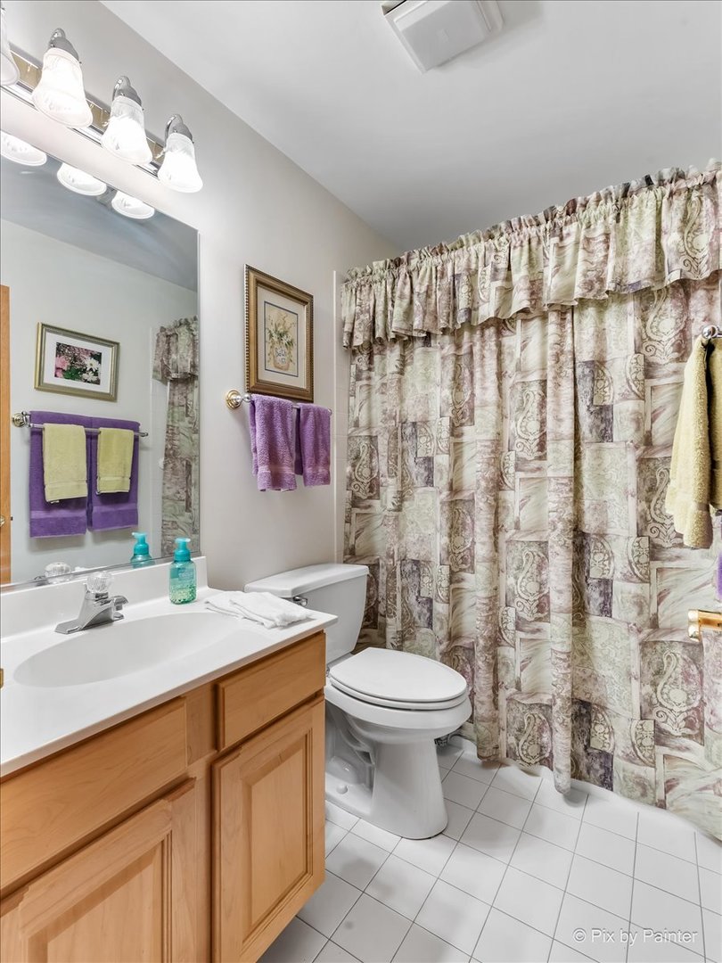 13412 Tall Pines Lane Plainfield, IL 60544 - Photo 14 of 19 a bathroom with a sink toilet and shower
