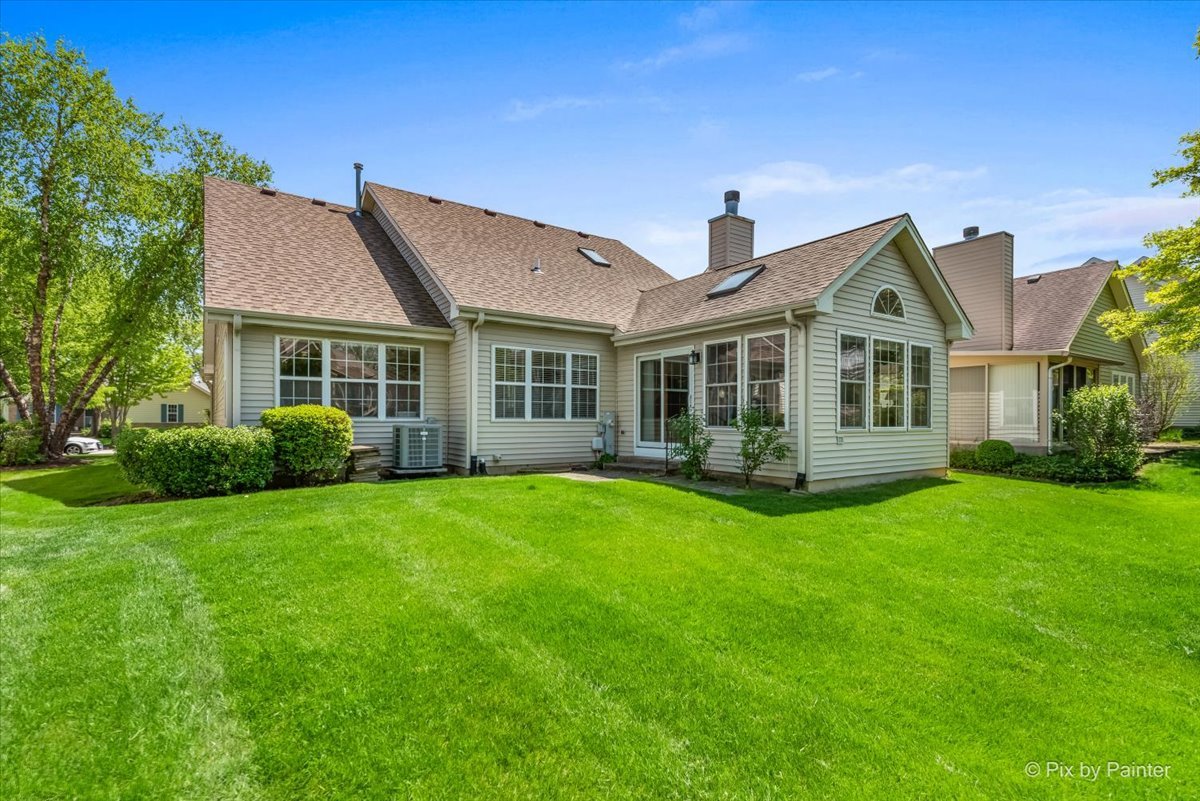13412 Tall Pines Lane Plainfield, IL 60544 - Photo 17 of 19 a view of a house with a backyard