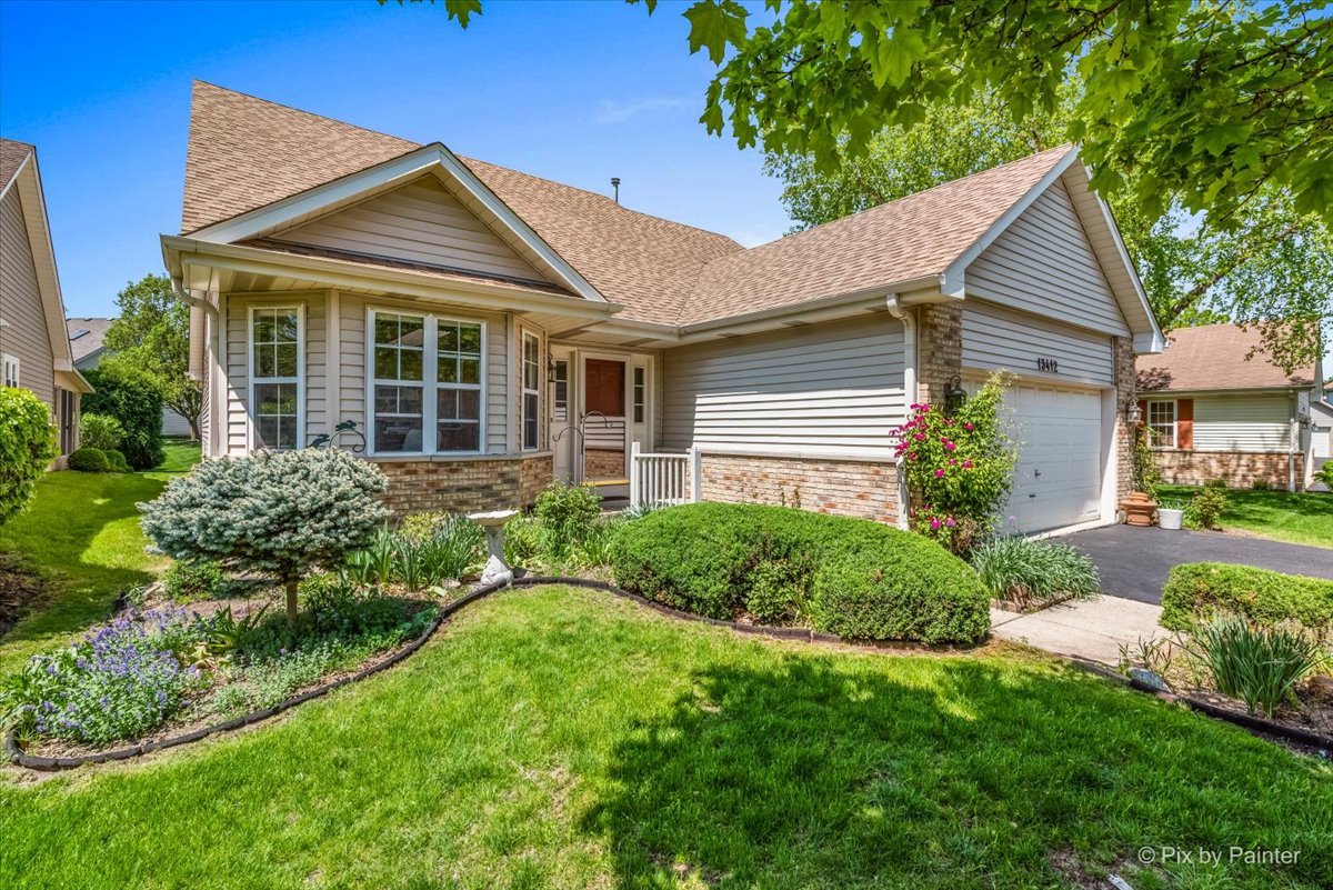 13412 Tall Pines Lane Plainfield, IL 60544 - Photo 2 of 19 a view of a house with a yard