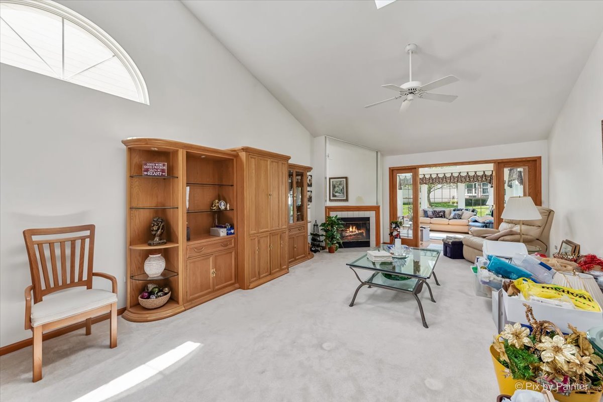 13412 Tall Pines Lane Plainfield, IL 60544 - Photo 3 of 19 a work room with furniture and a large window