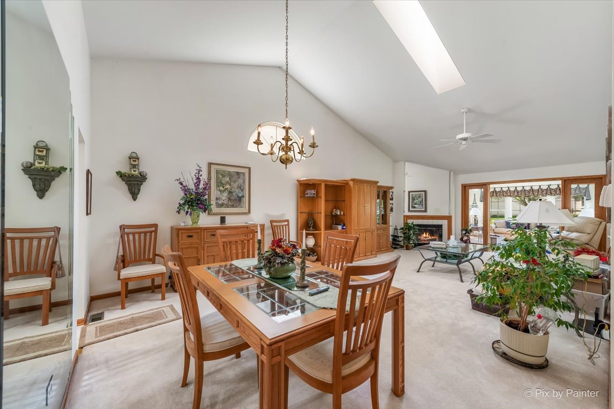 13412 Tall Pines Lane Plainfield, IL 60544 - Photo 5 of 19 a view of a dining room with furniture window and outside view