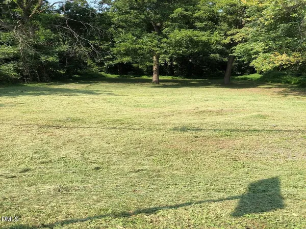 a view of a swimming pool and an outdoor space