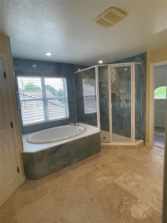759 Fordingbridge Way Osprey, FL 34229 - Photo 10 of 51 a spacious bathroom with a tub and shower