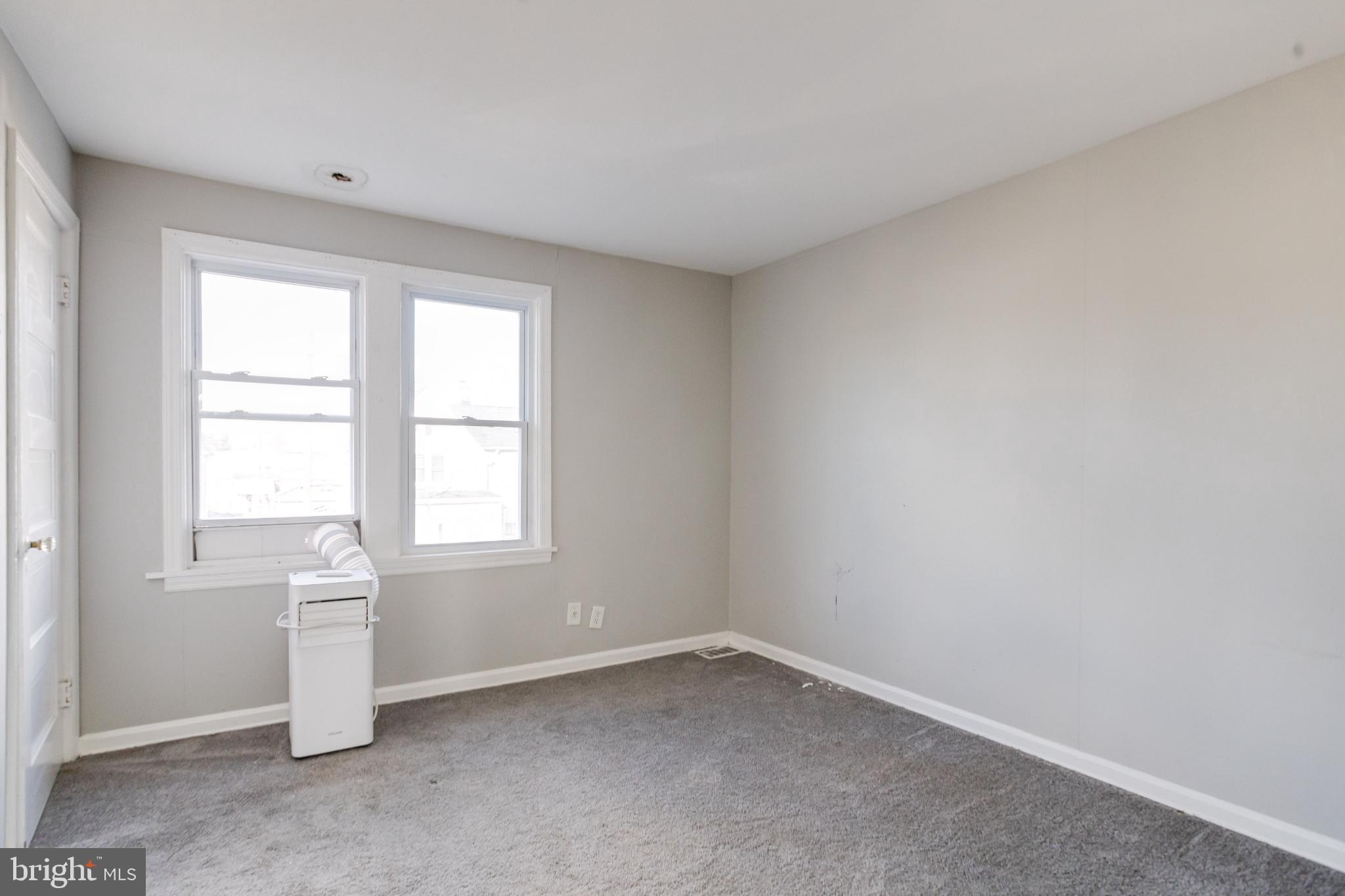 6573 St Helena Avenue Baltimore, MD 21222 - Photo 20 of 37 an empty room with a window
