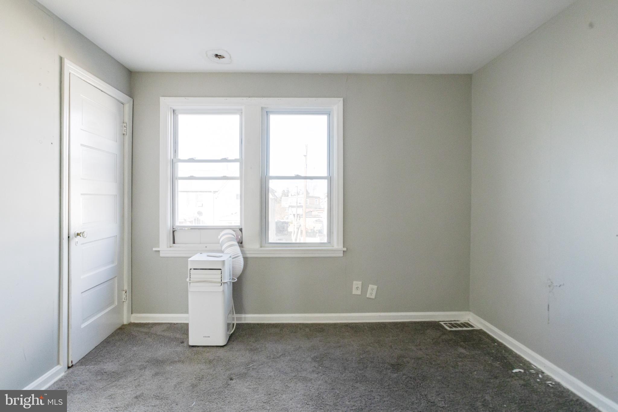 6573 St Helena Avenue Baltimore, MD 21222 - Photo 21 of 37 an empty room with windows
