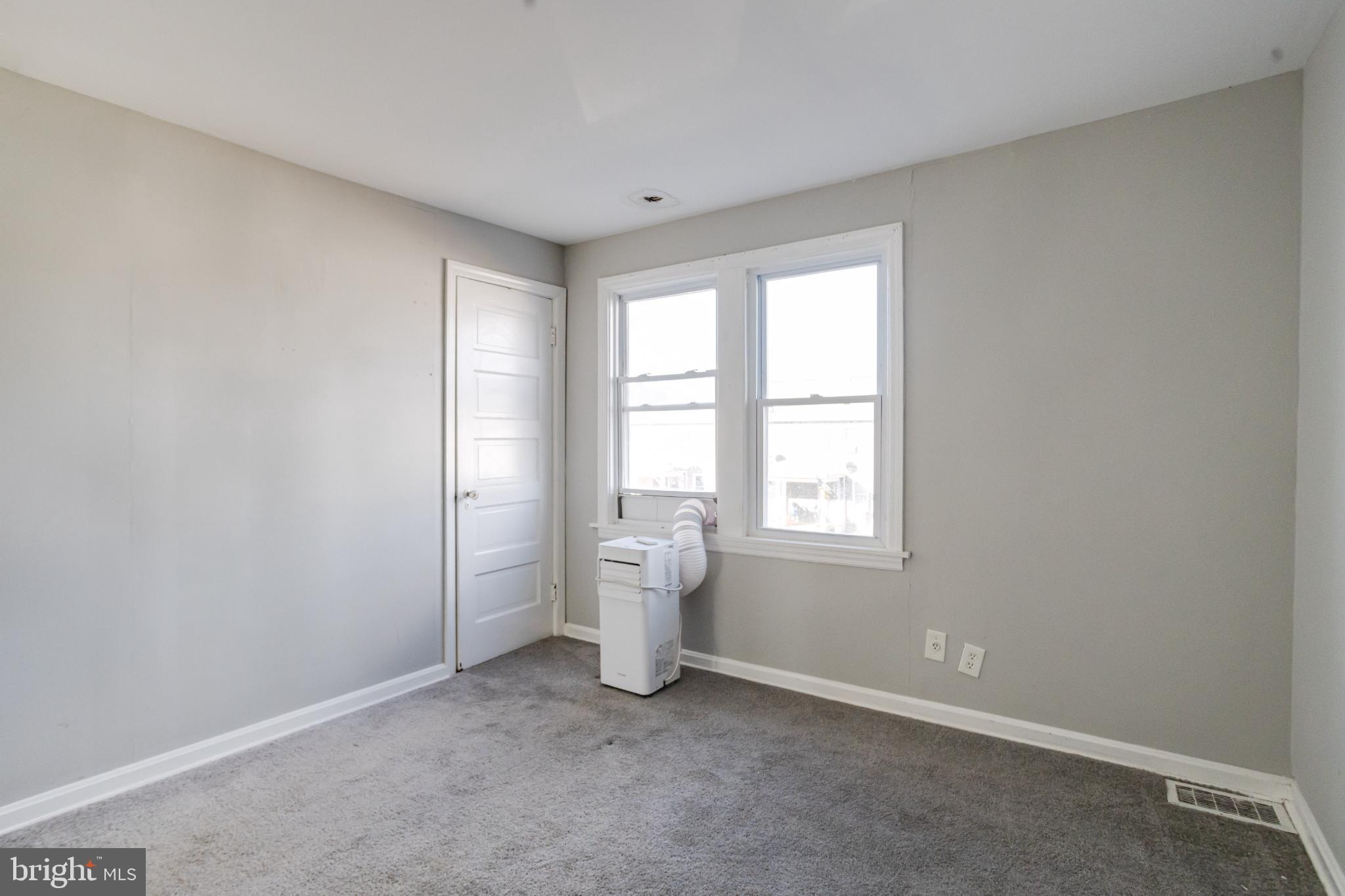 6573 St Helena Avenue Baltimore, MD 21222 - Photo 22 of 37 an empty room with windows