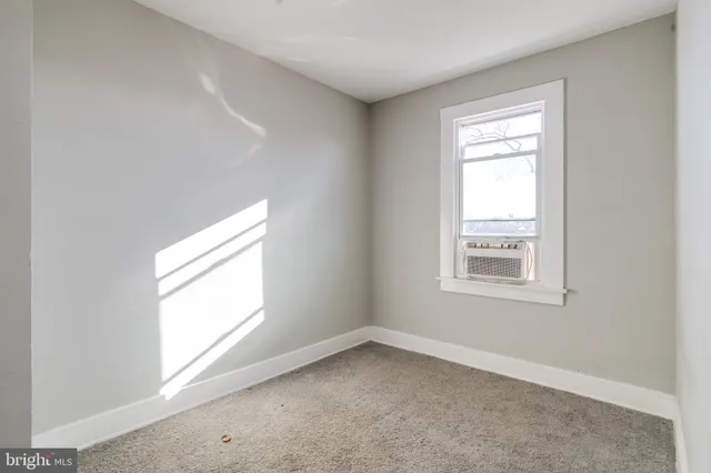 an empty room with a window