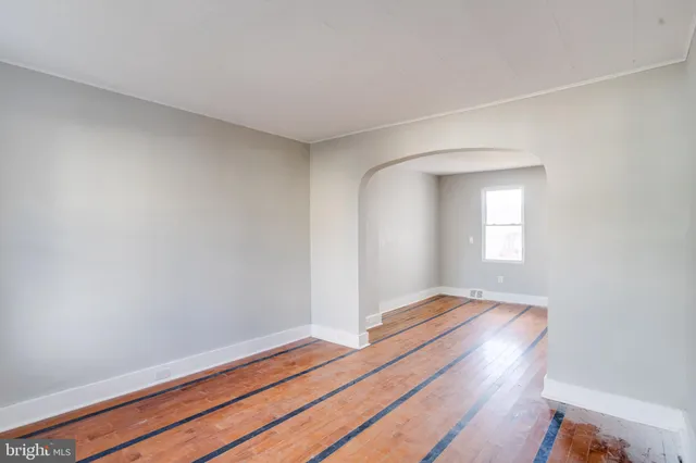 a view of wooden floor in an empty room