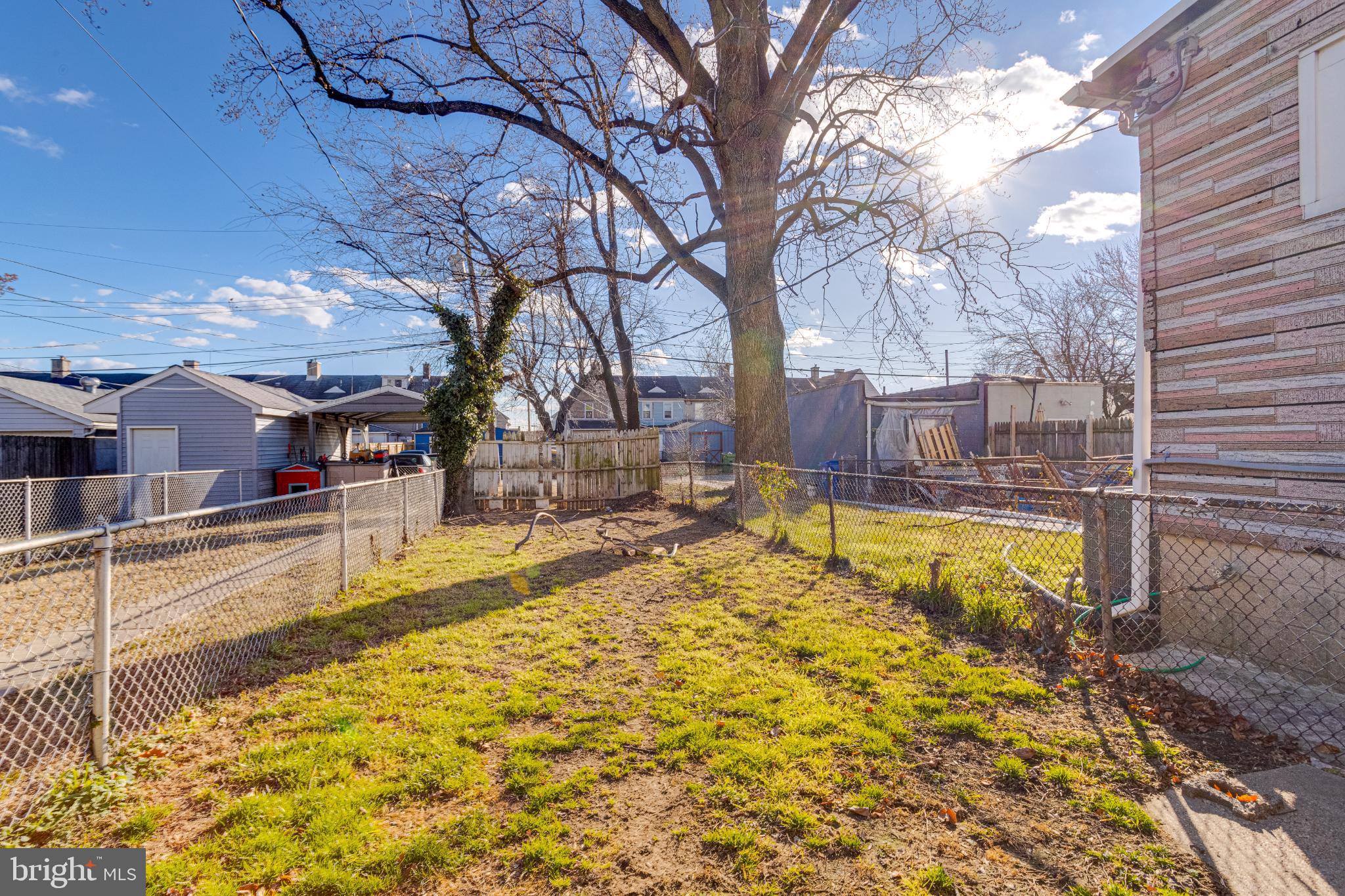 6573 St Helena Avenue Baltimore, MD 21222 - Photo 33 of 37 a swimming pool with outdoor seating and yard