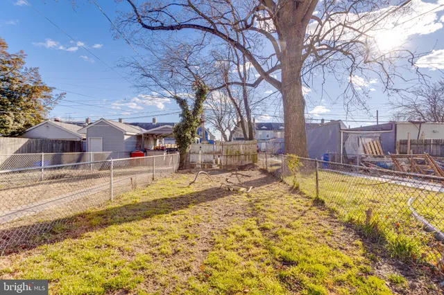 a view of a house with snow on the background