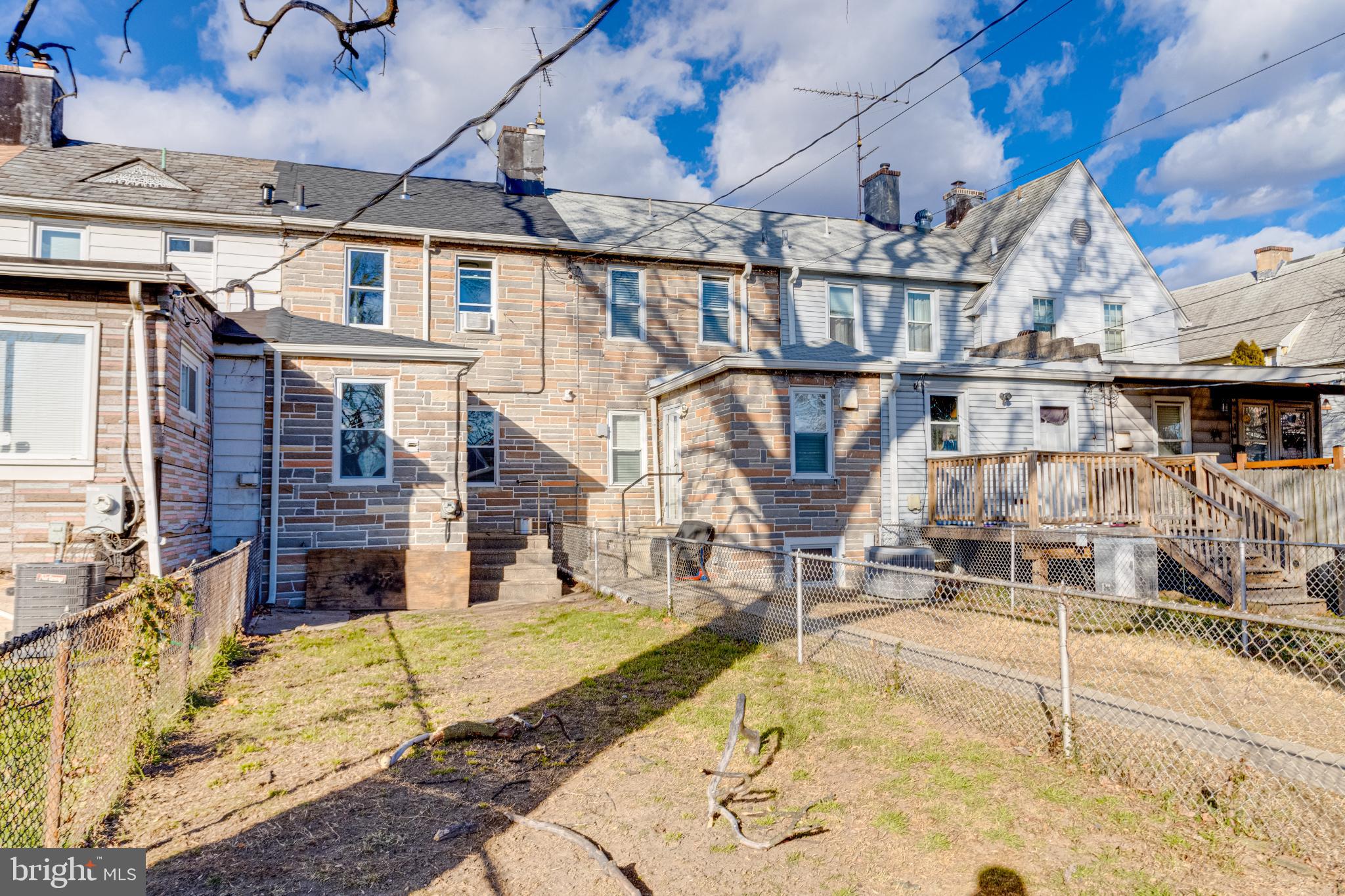 6573 St Helena Avenue Baltimore, MD 21222 - Photo 37 of 37 a house with large trees and outdoor space