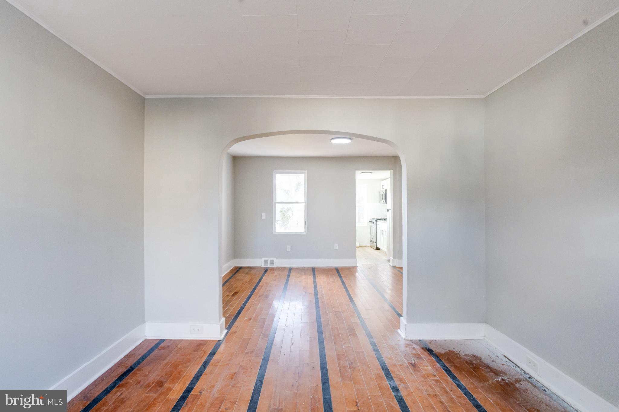6573 St Helena Avenue Baltimore, MD 21222 - Photo 4 of 37 a view of wooden floor in a room