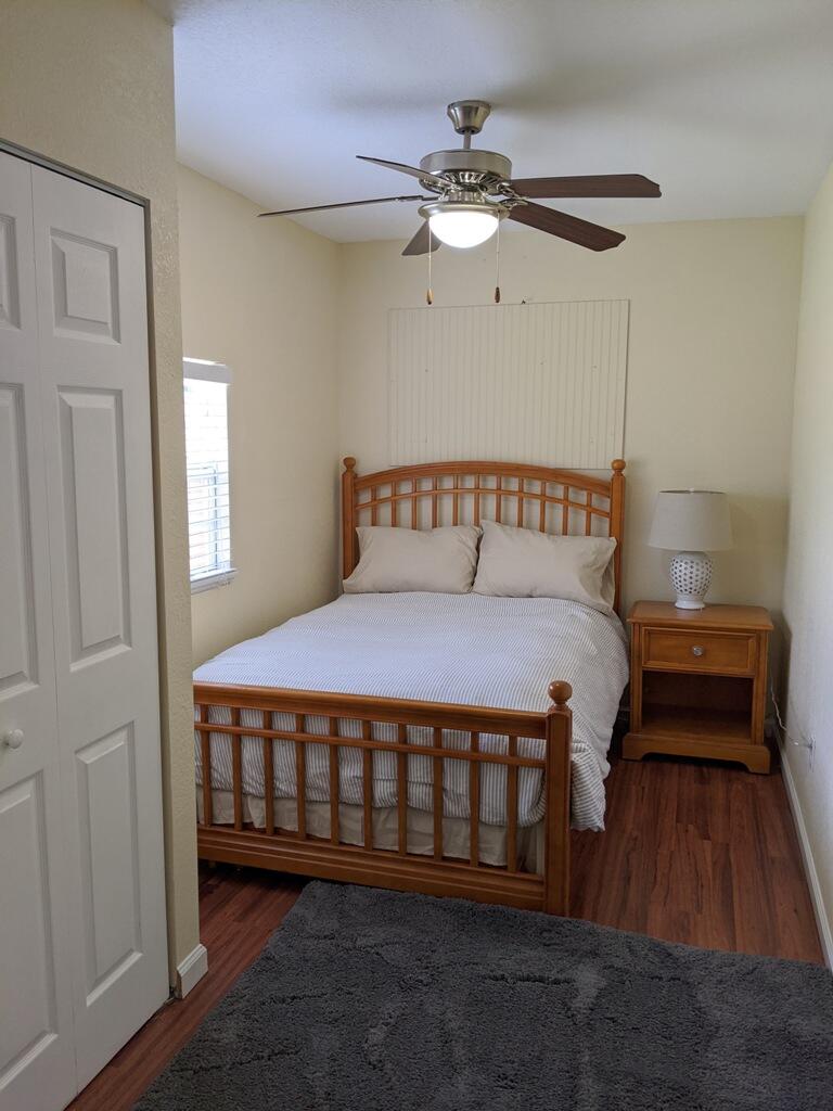 1350 Riverside Circle, Unit S A AND B Wellington, FL 33414 - Photo 62 of 67 a bedroom with a bed and a table