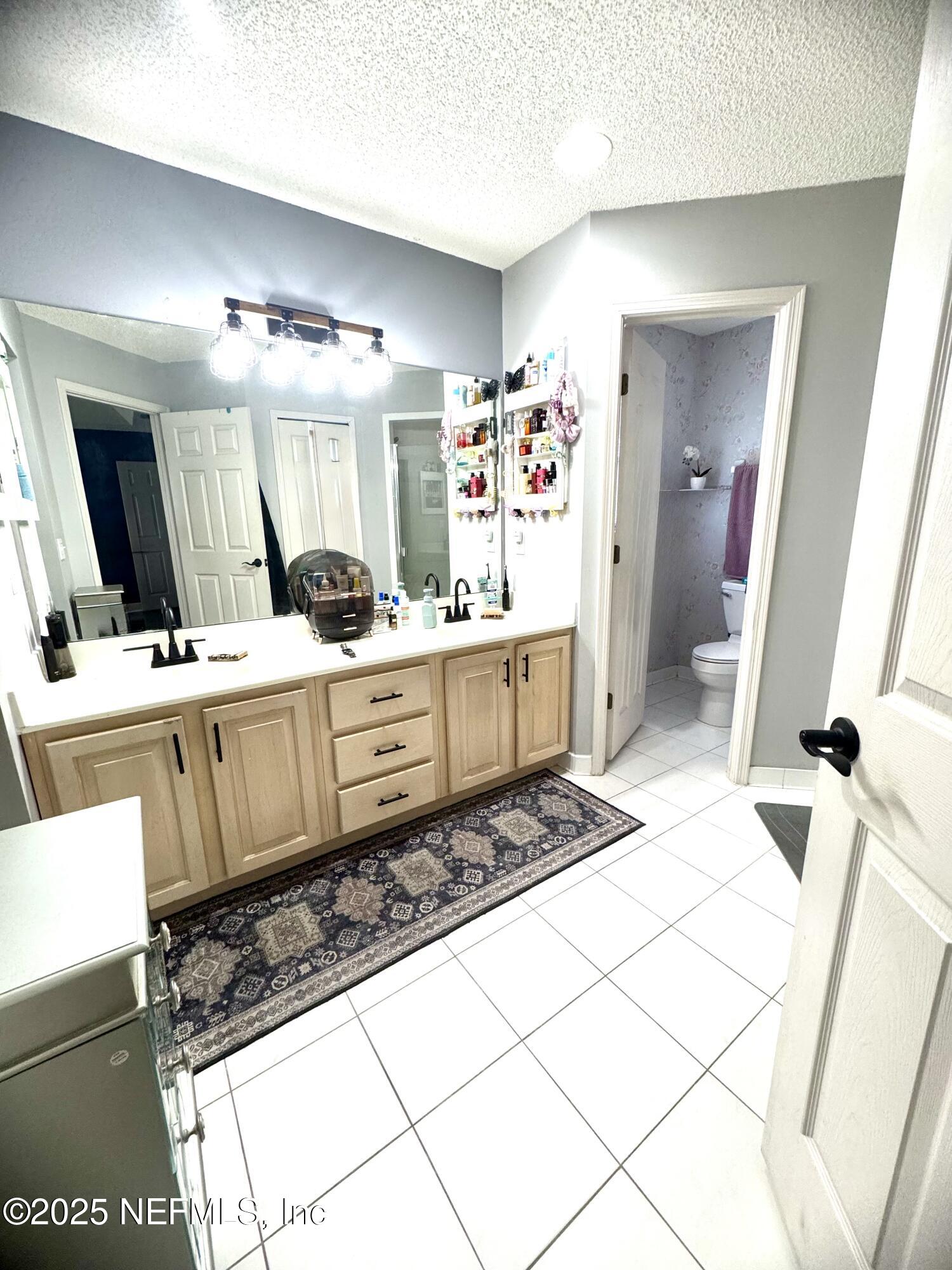 627 Whitfield Road Jacksonville, FL 32221 - Photo 13 of 18 a kitchen with a sink and a stove top oven