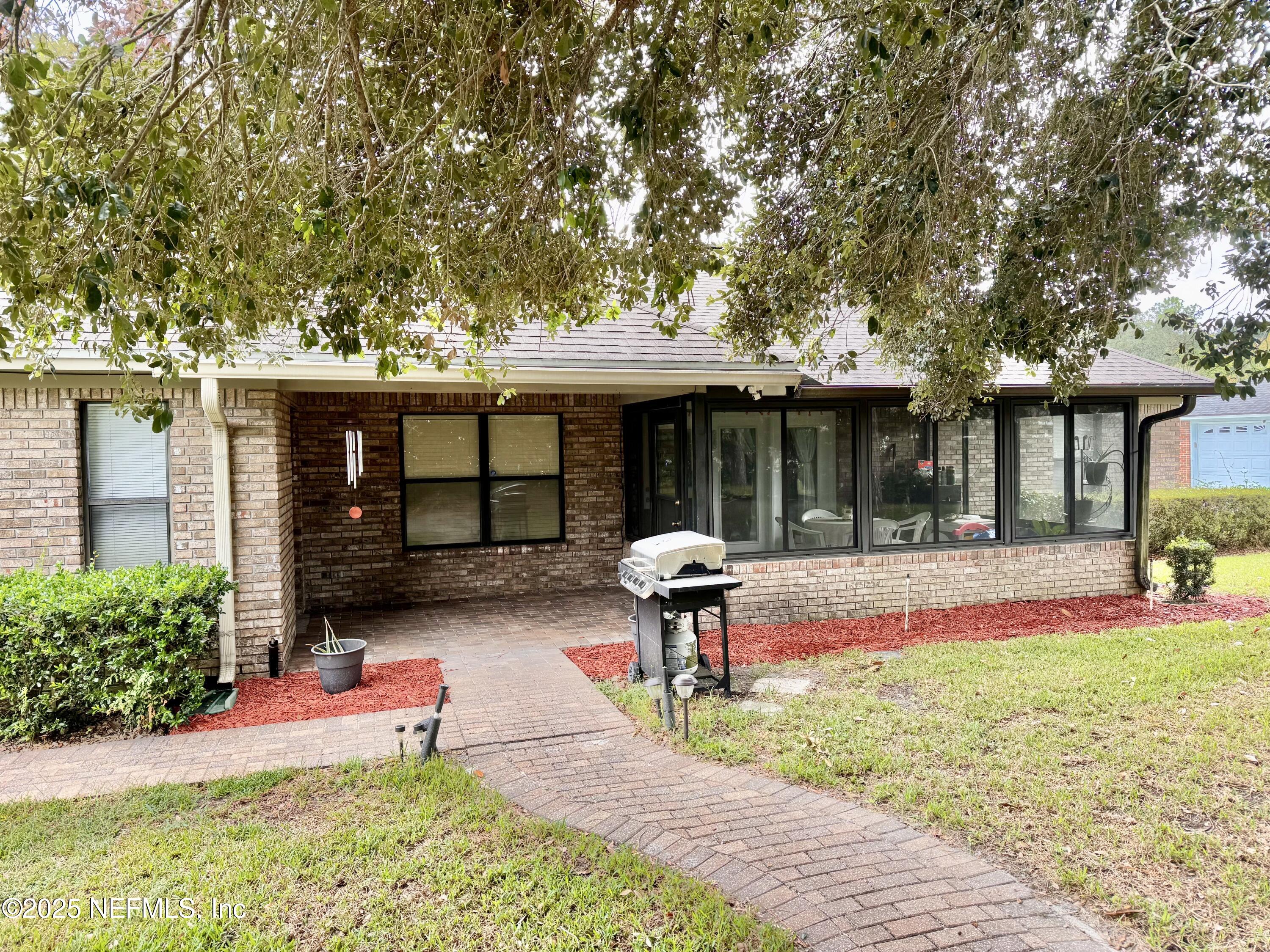 627 Whitfield Road Jacksonville, FL 32221 - Photo 18 of 18 a front view of a house with garden