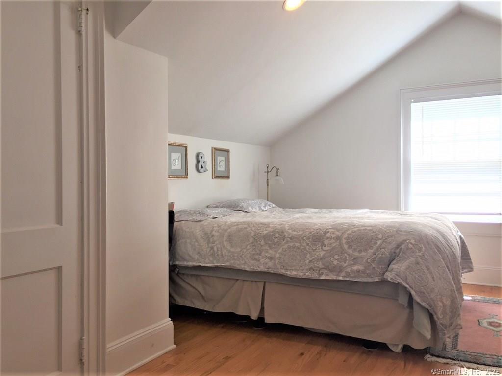 209 Willard Street, Unit 3 New Haven, CT 06515 - Photo 19 of 29 a bedroom with a bed and a window