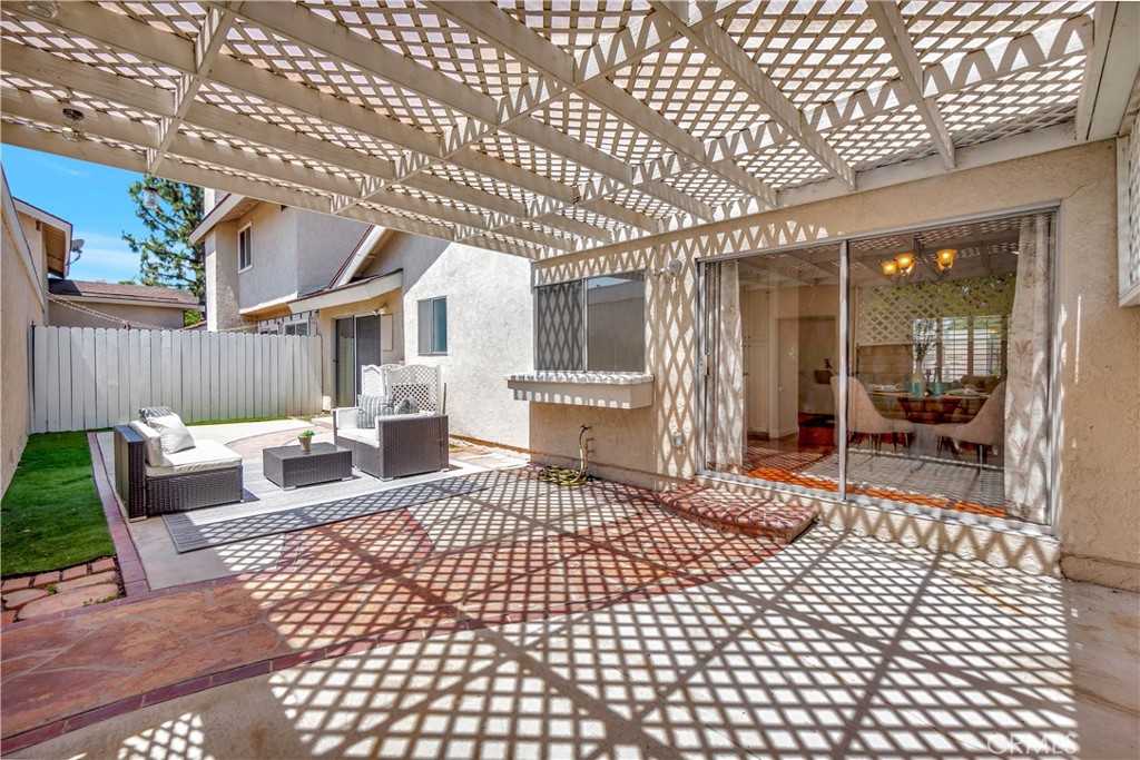 30 Silverwood Irvine, CA 92604 - Photo 25 of 32 a view of a patio with a chairs and table in a patio
