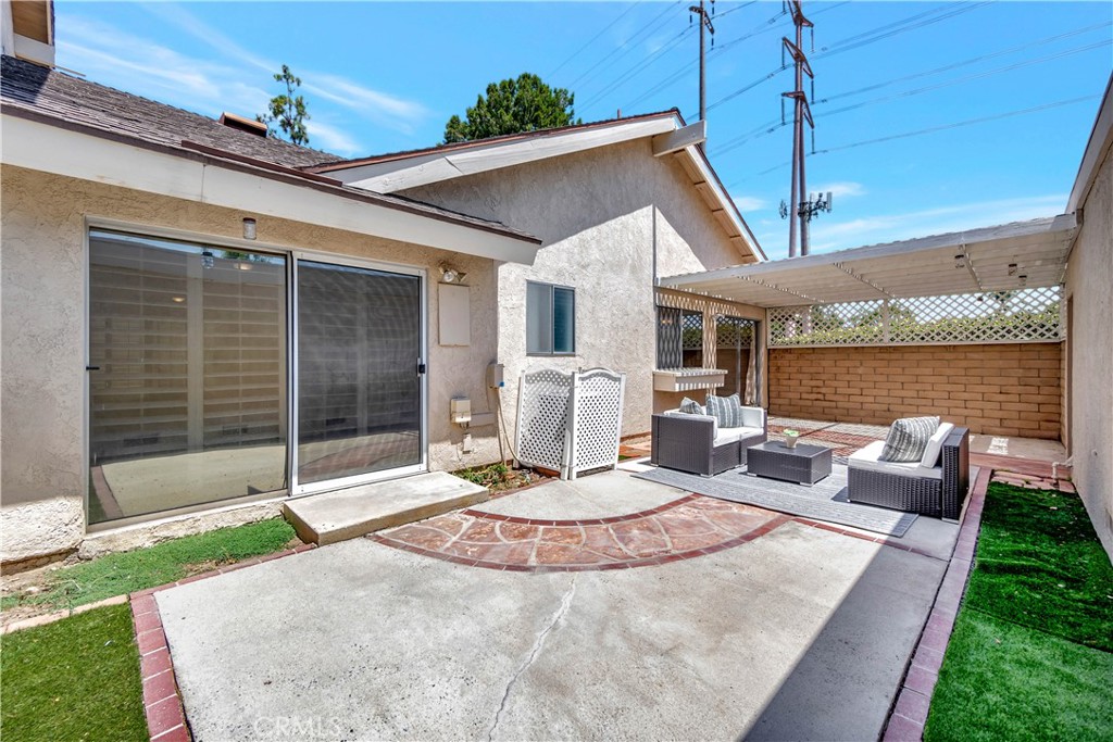 30 Silverwood Irvine, CA 92604 - Photo 26 of 32 a view of a house with backyard and sitting area