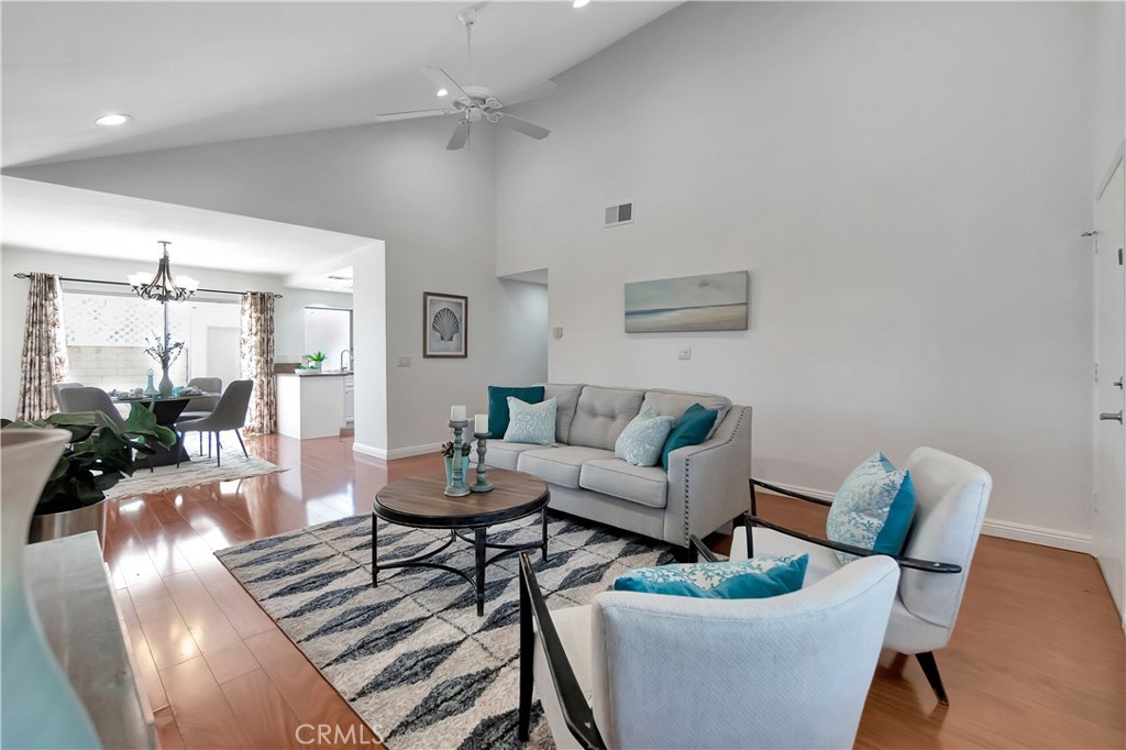 30 Silverwood Irvine, CA 92604 - Photo 3 of 32 a living room with furniture and a potted plant