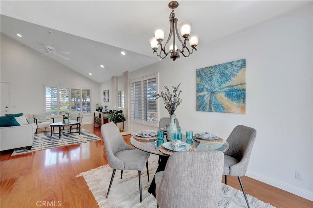 30 Silverwood Irvine, CA 92604 - Photo 9 of 32 a view of a dining room with furniture wooden floor and chandelier