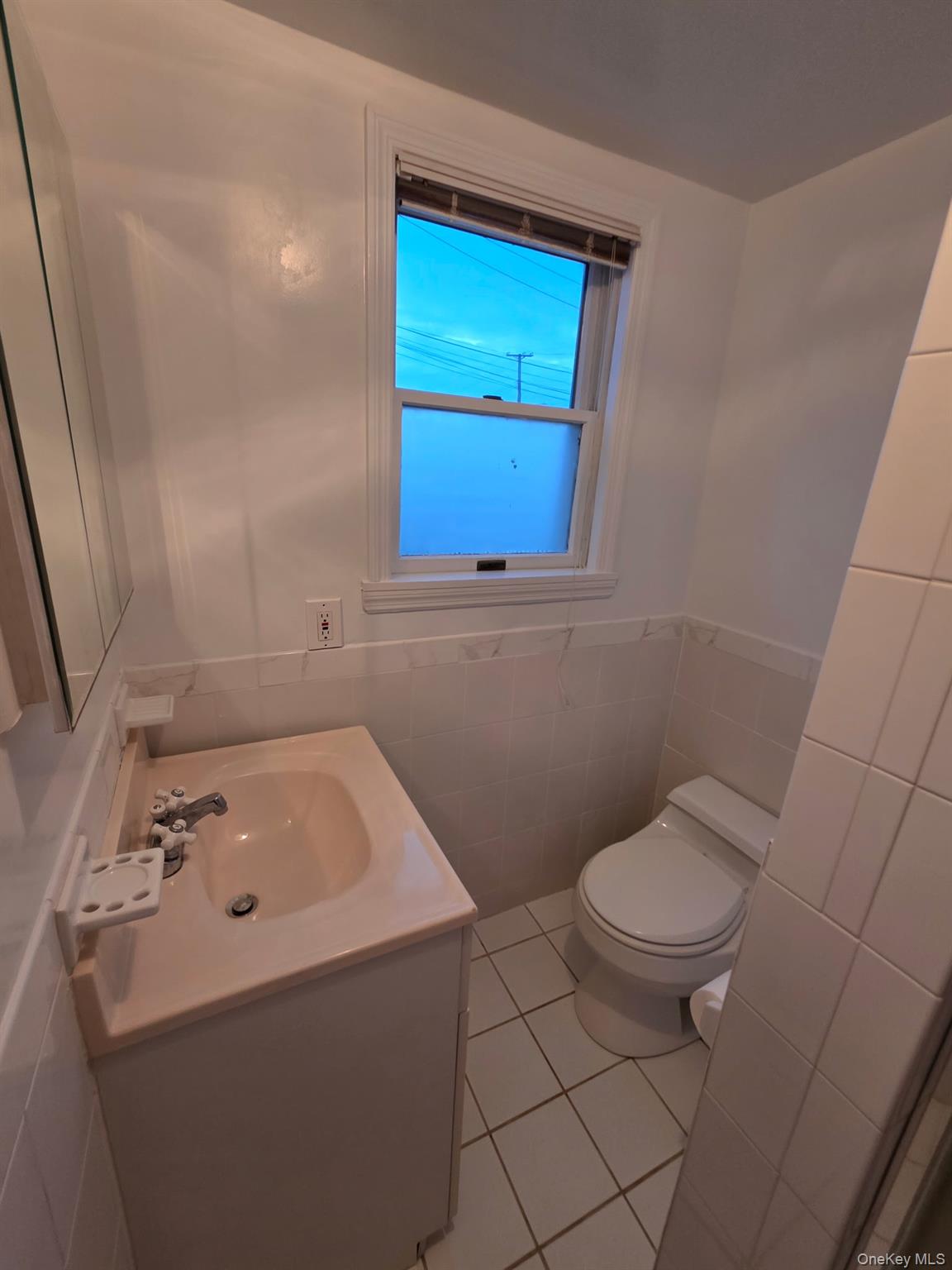12-14 West 5th Road Queens, NY 11693 - Photo 15 of 43 a bathroom with a sink and a toilet