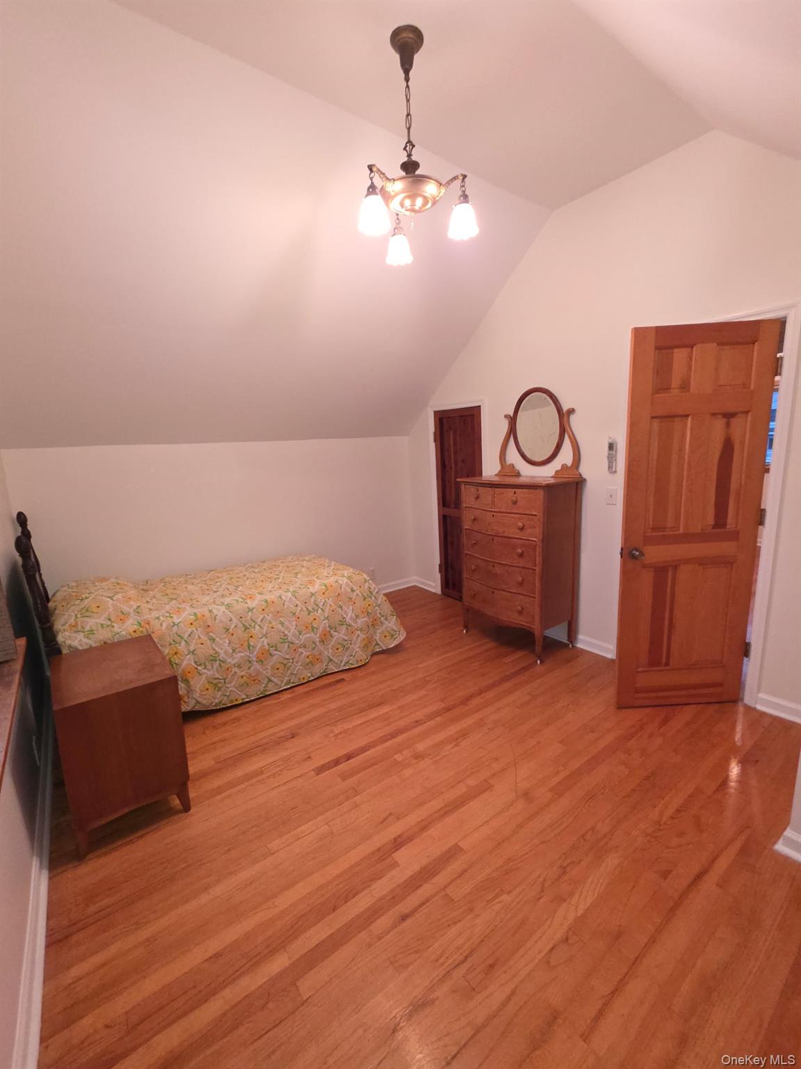 12-14 West 5th Road Queens, NY 11693 - Photo 17 of 43 a bedroom with a bed and cabinets