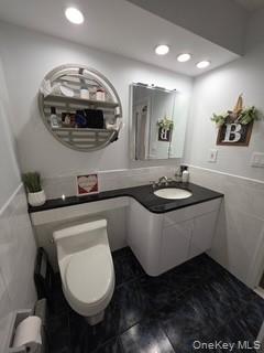 12-14 West 5th Road Queens, NY 11693 - Photo 20 of 43 a bathroom with a sink and a mirror