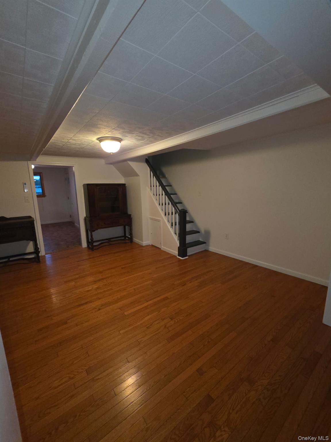 12-14 West 5th Road Queens, NY 11693 - Photo 2 of 43 a view of empty room with wooden floor