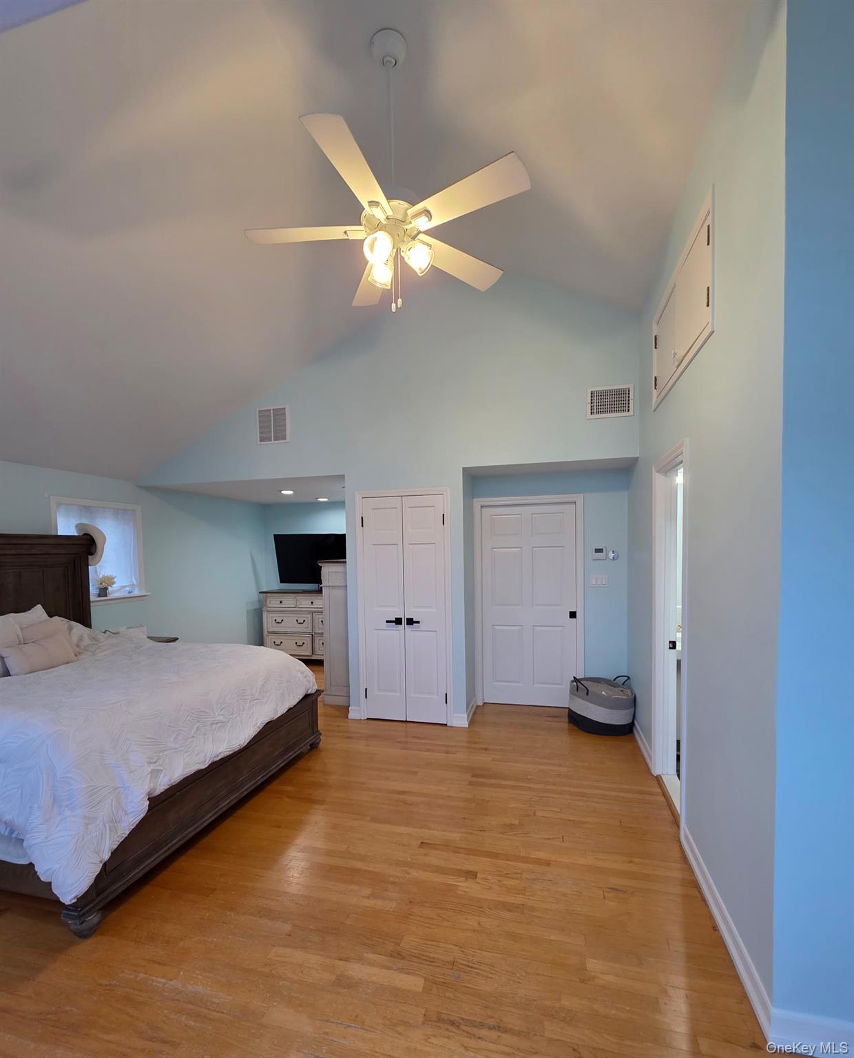 12-14 West 5th Road Queens, NY 11693 - Photo 23 of 43 a bedroom with a bed and a ceiling fan