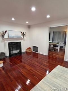12-14 West 5th Road Queens, NY 11693 - Photo 36 of 43 a living room with furniture and a fireplace