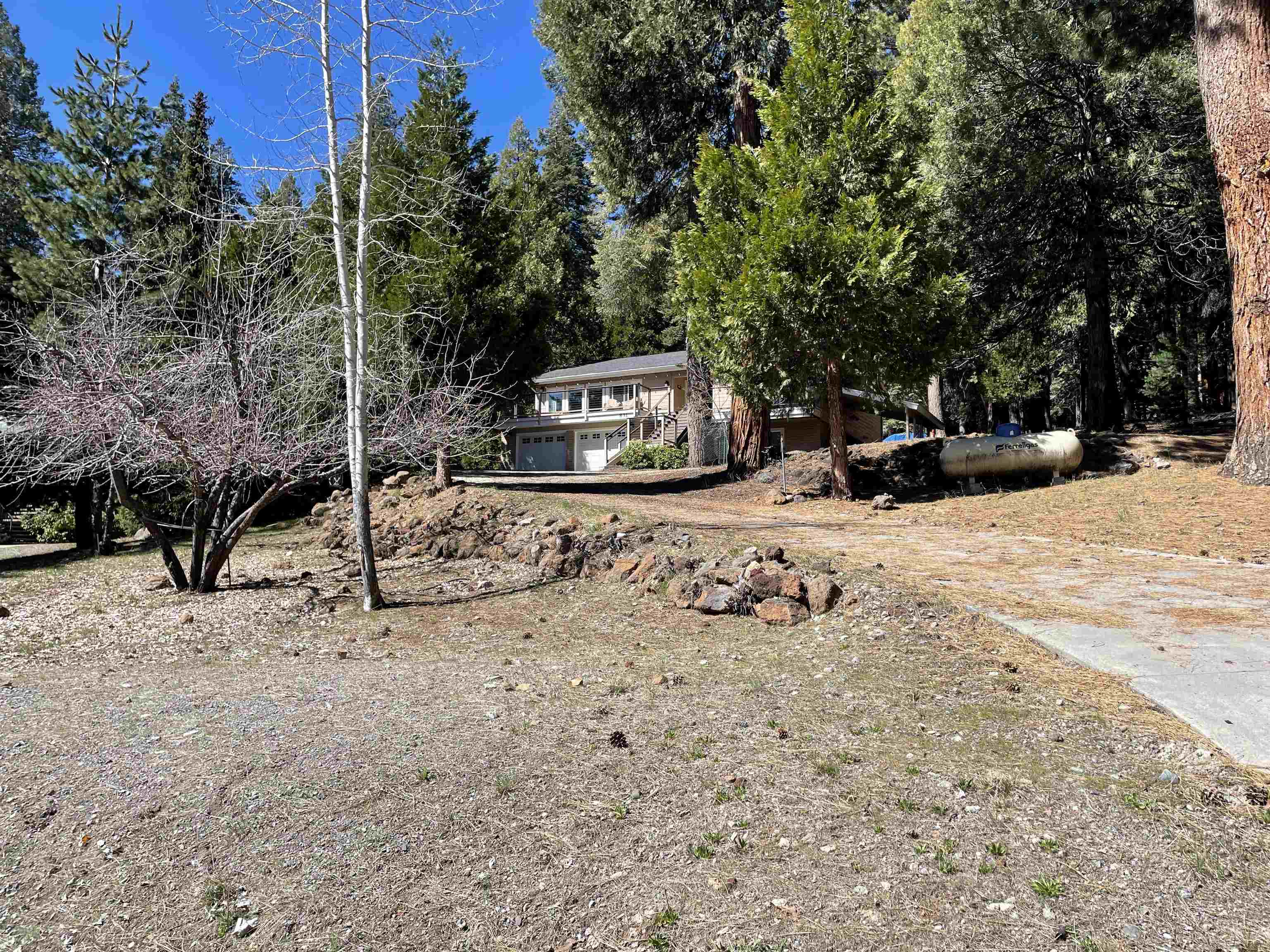 831 Timber Ridge Road Lake Almanor, CA 96137 - Photo 34 of 36 a view of a snow in the backyard of the house