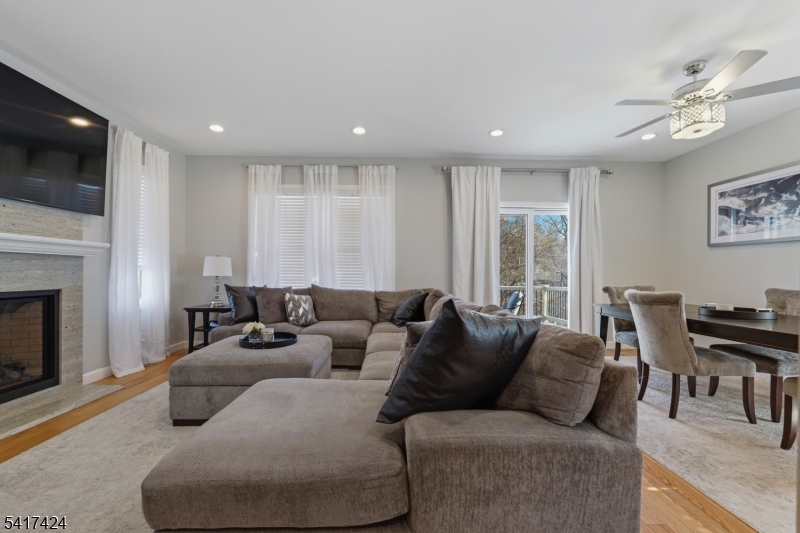 68 Arch Street Butler, NJ 07405 - Photo 16 of 46 a living room with furniture and a fireplace