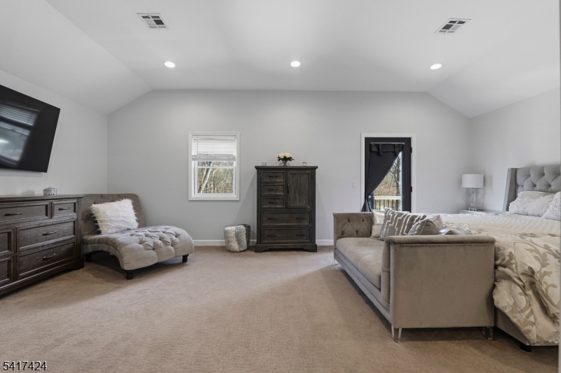 68 Arch Street Butler, NJ 07405 - Photo 20 of 46 a living room with furniture and a flat screen tv