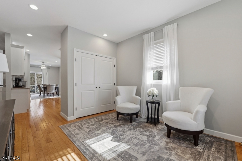 68 Arch Street Butler, NJ 07405 - Photo 4 of 46 a living room with furniture and a rug