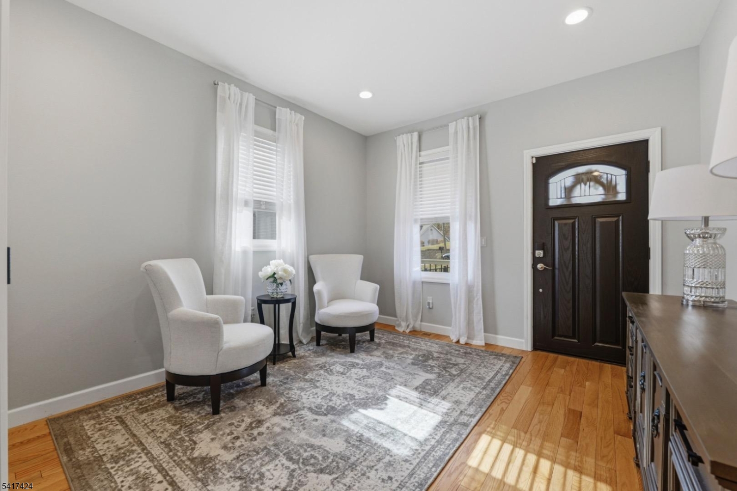 68 Arch Street Butler, NJ 07405 - Photo 5 of 46 a living room with furniture and a rug