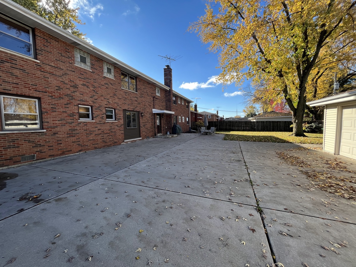 517 Bethel Drive, Unit 2S Joliet, IL 60435 - Photo 18 of 18 a view of a house with a yard