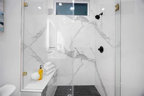 a bathroom with a sink and toilet