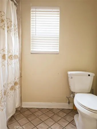 a bathroom with a toilet