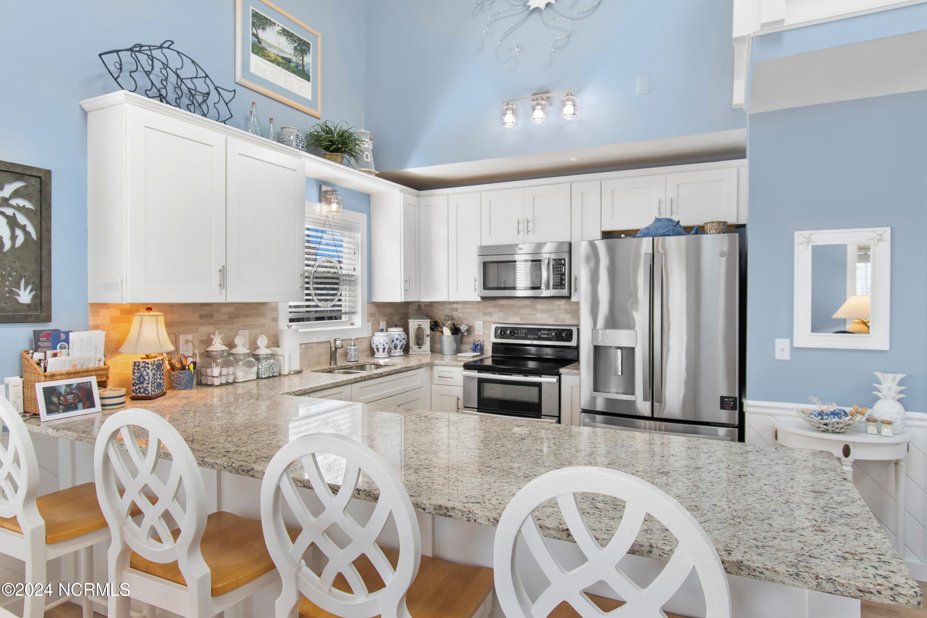 415 Sailfish Street Sunset Beach, NC 28468 - Photo 17 of 63 Kitchen