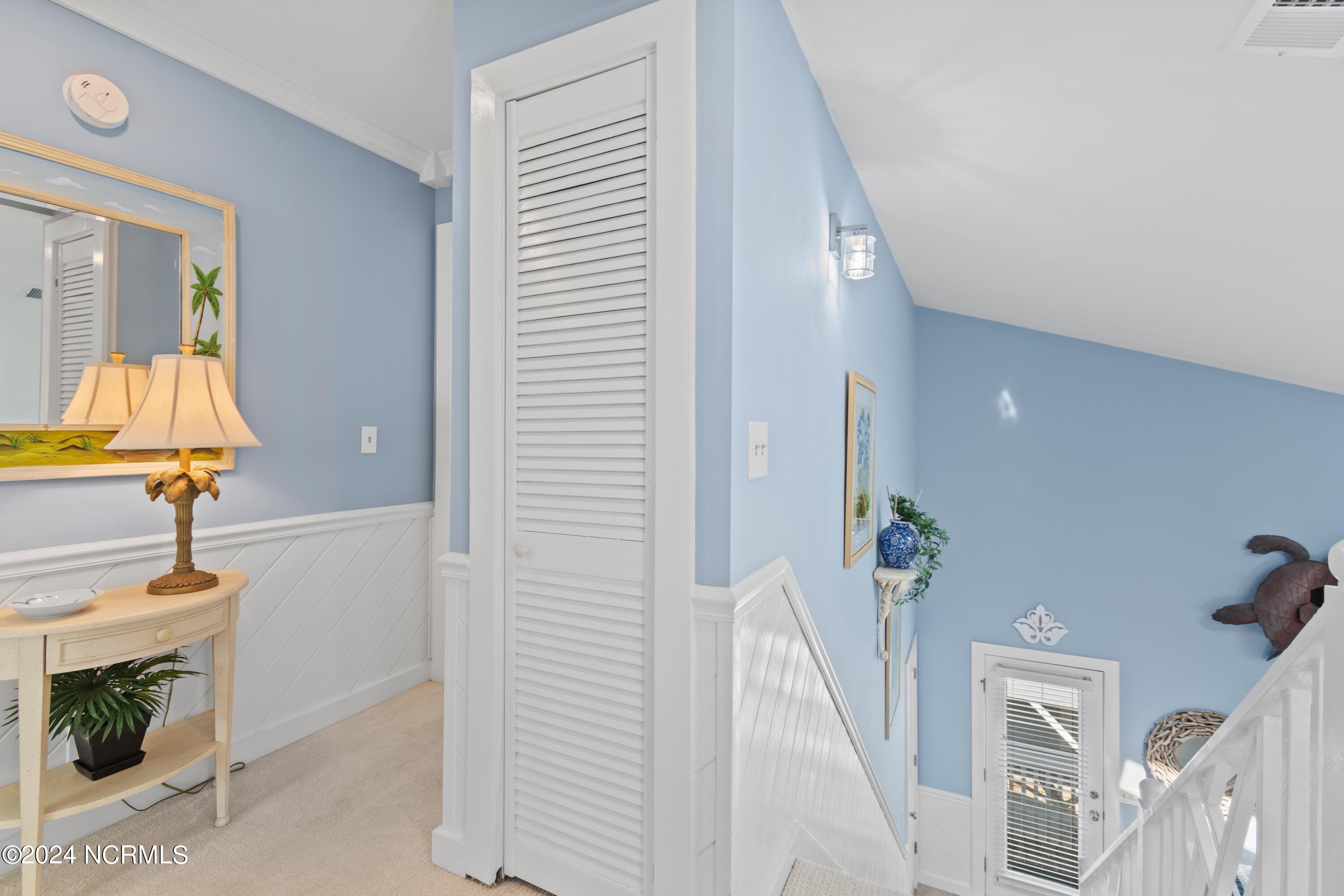 415 Sailfish Street Sunset Beach, NC 28468 - Photo 32 of 63 Upstairs hallway.