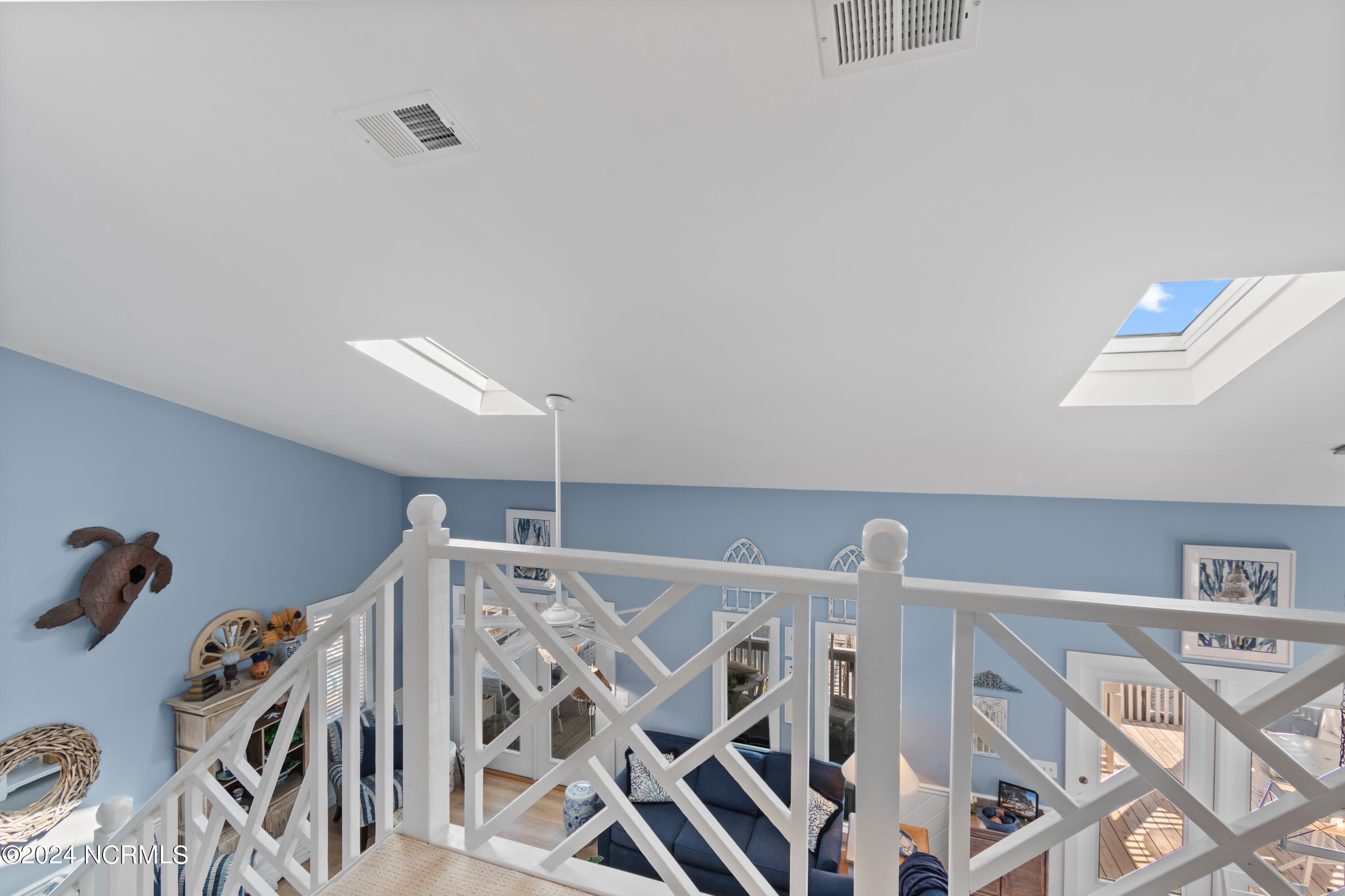 415 Sailfish Street Sunset Beach, NC 28468 - Photo 33 of 63 Beautiful stair railings.