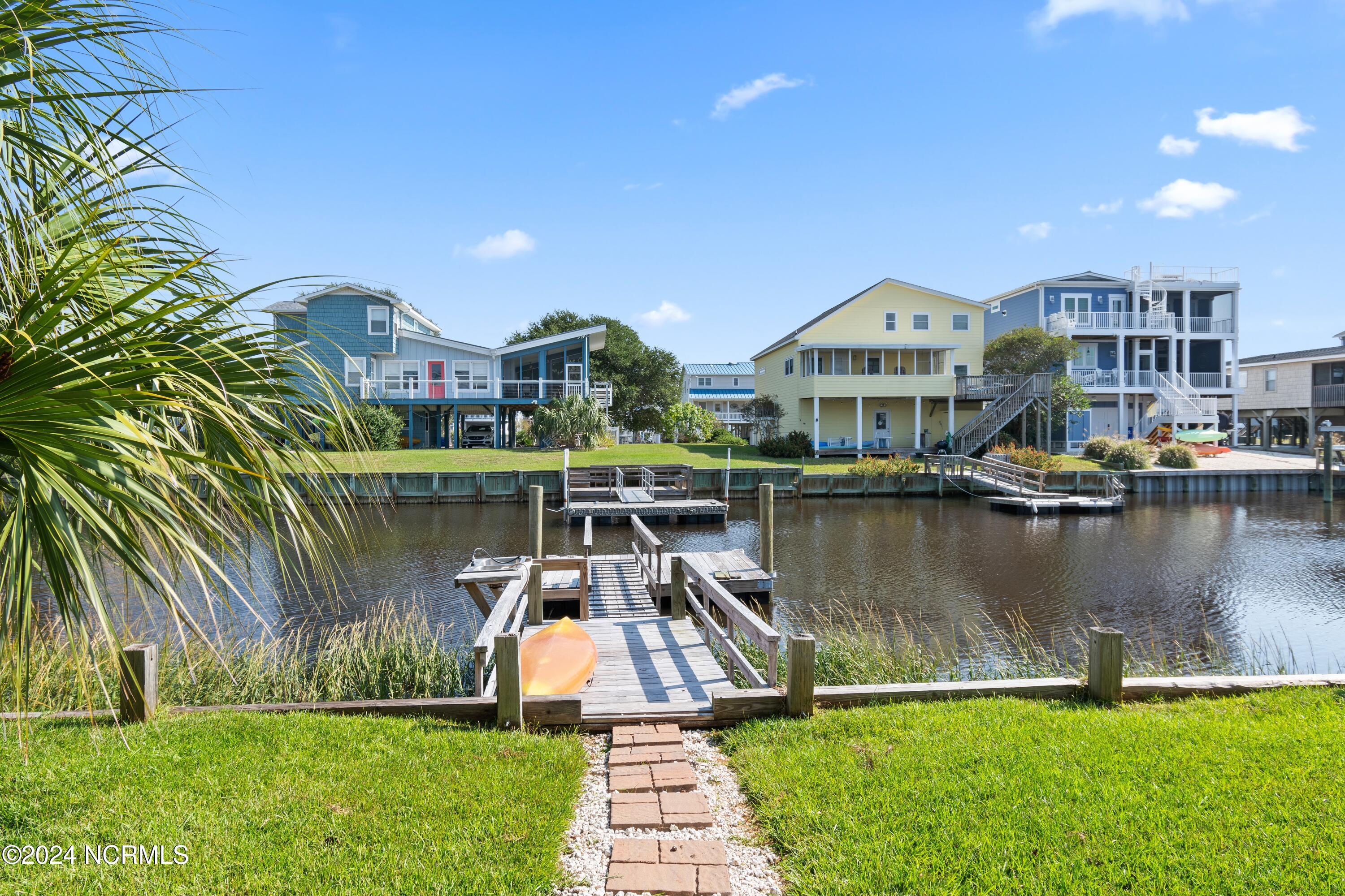415 Sailfish Street Sunset Beach, NC 28468 - Photo 6 of 63 New Seawall in 2025