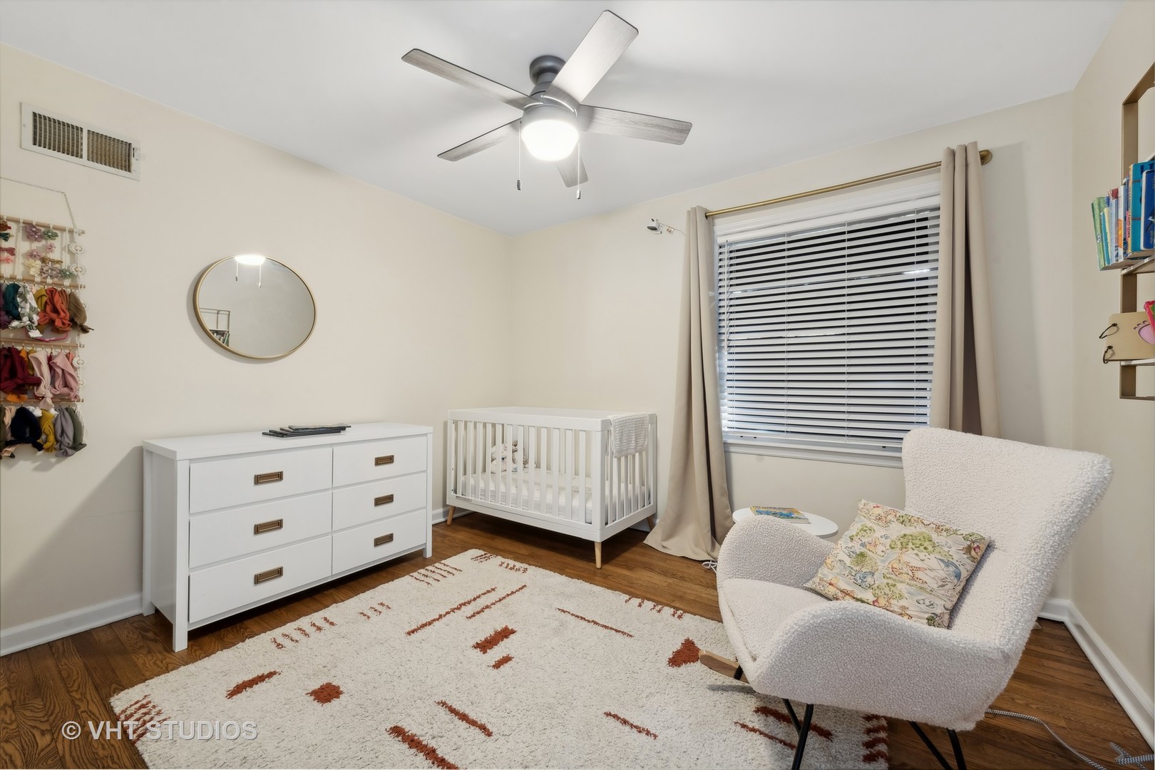 412 Warwick Road Tower Lakes, IL 60010 - Photo 14 of 30 a bedroom with a baby bed couch and a window